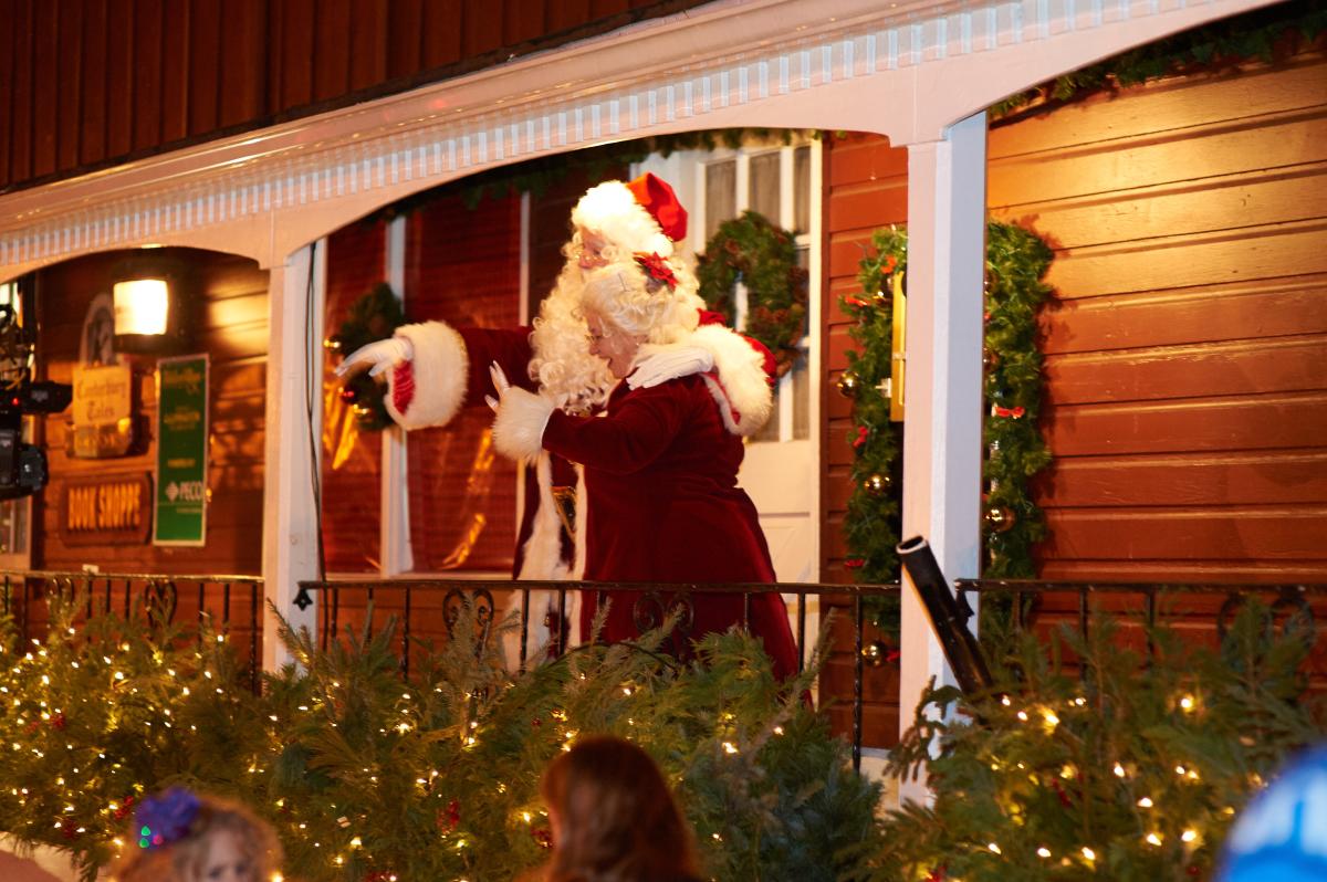 Santa and Mrs. Claus greet the crowd during Grand Illumination at Peddler's Village.