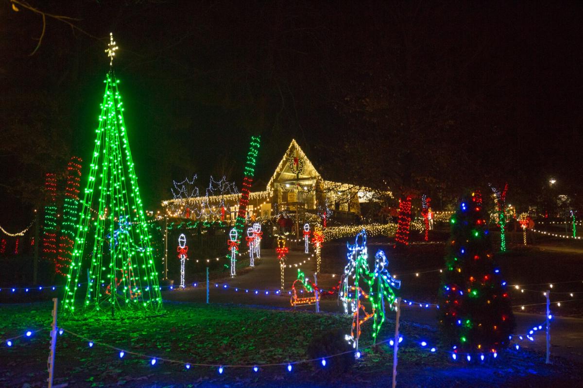 The visitor center at Noccalula Falls and the walkway in front strewn with Christmas lights