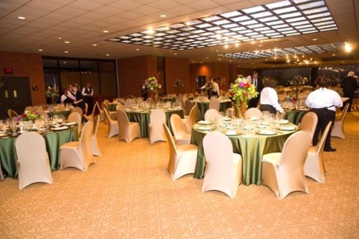 Gray Library Reception Floor Meeting Areas With Waiters and Round Tables 