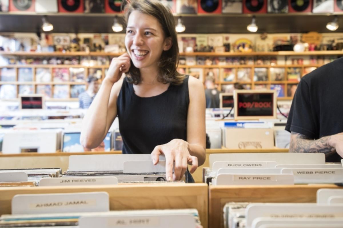 Looking through records at Revival Records in downtown Eau Claire