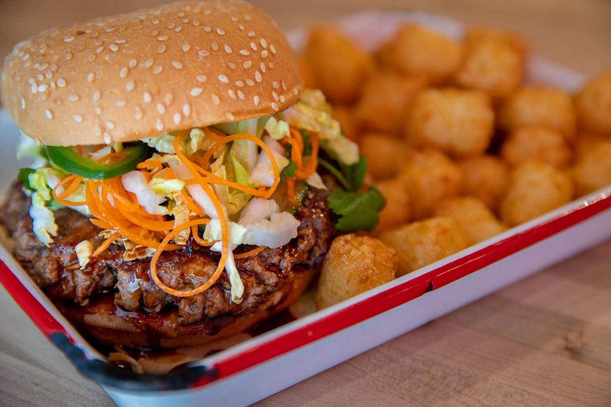 A plated burger dish from Certified Burgers & Beverage on St. Simons Island, GA