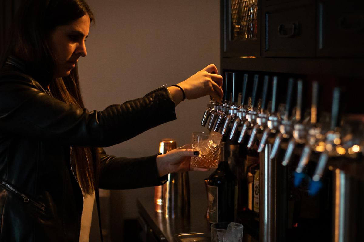 Bartender pours a cocktail at Y.N.K. in Irvine