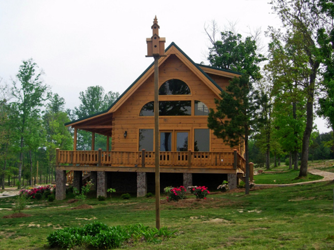 A large house that resembles a log cabin.