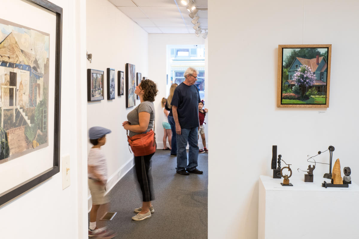 People admiring art pieces at Art Gallery