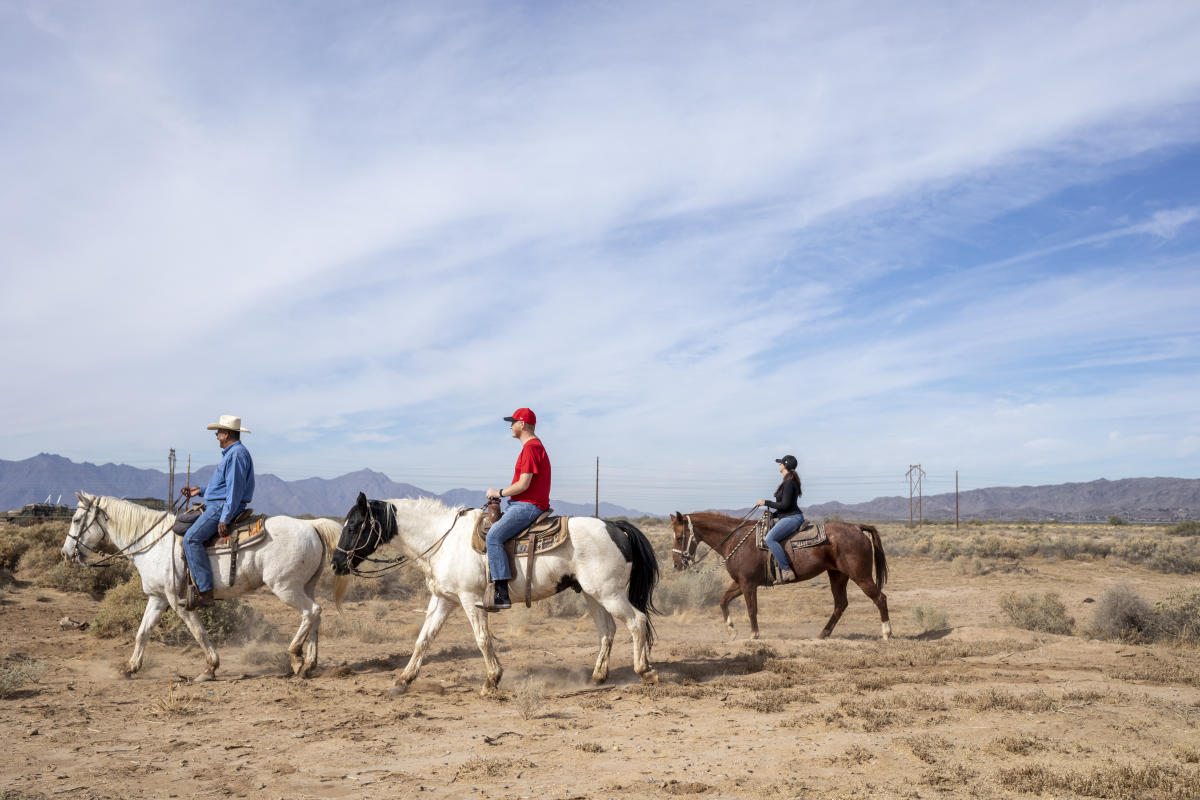 Men Riding Horses at Koli Equestrian Center in Chandler