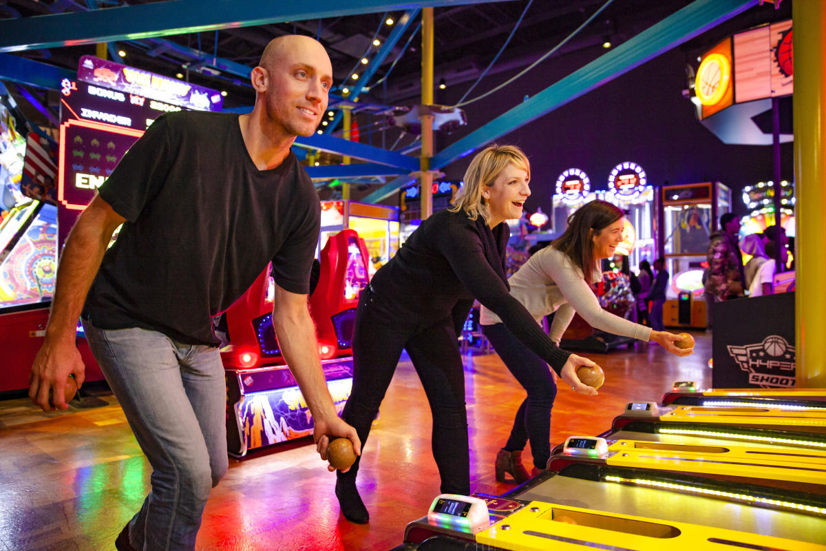 Families playing games at Main Event Entertainment in DuPage