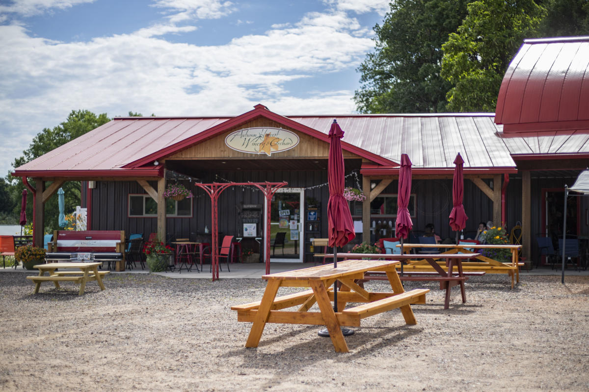 Exterior of Autumn Harvest Winery & Orchard with picnic tables
