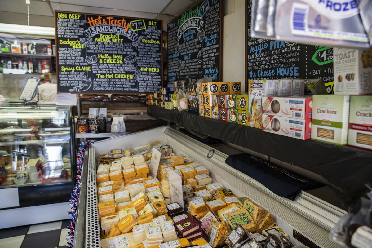 Cheese and other foods for sale at Eau Claire Cheese and Deli