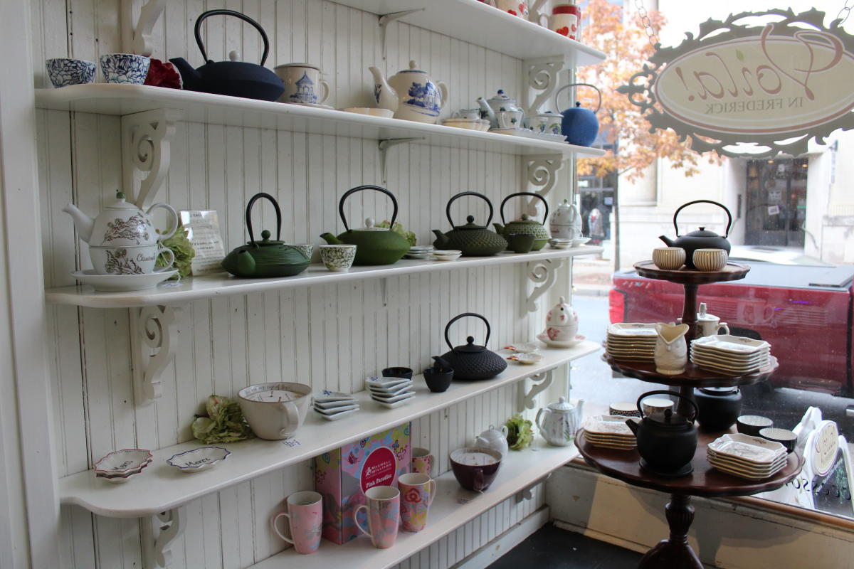 Tea kettles, pots, saucers and cups at Voila