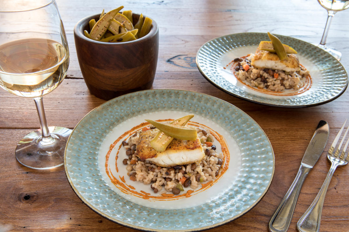 A plated seafood dish and wine pairing from Georgia Sea Grill on St. Simons Island, GA