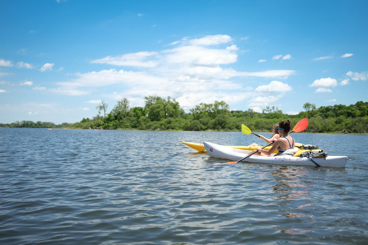 Two women kayaking on Lake Wingra Madison, WI