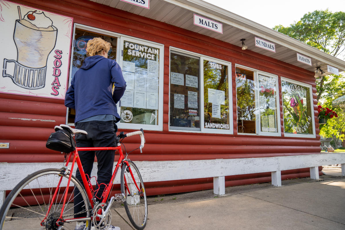 Bicyclist outside of Monona Bait and Ice Cream