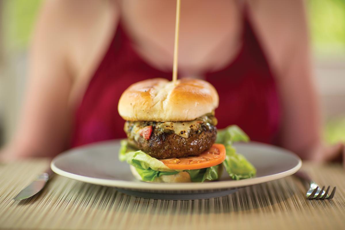 The green chile cheeseburger, from Blue Heron Restaurant, is a meat eater's dream.