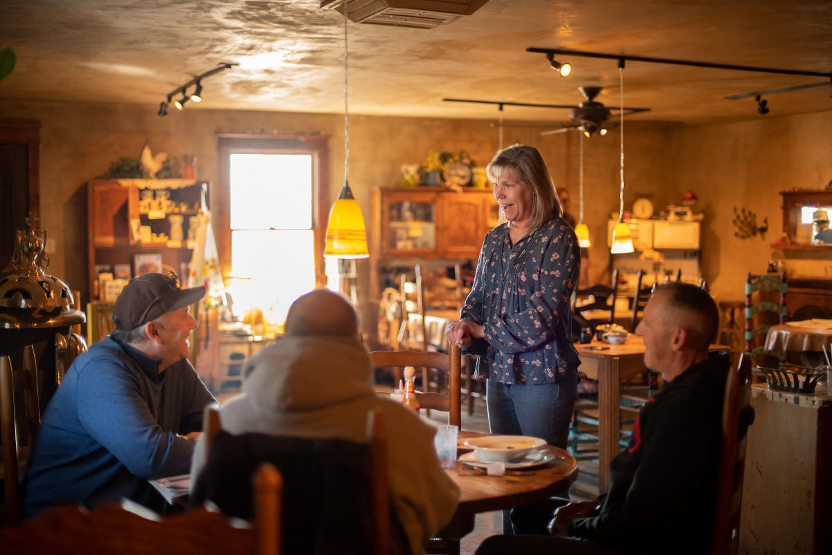 Cindy Holloway chats with customers.