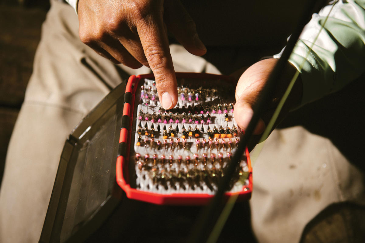 Maktima crafts his own flies and, rather than making imitators of aquatic insects, prefers attractors that get the trout's attention.