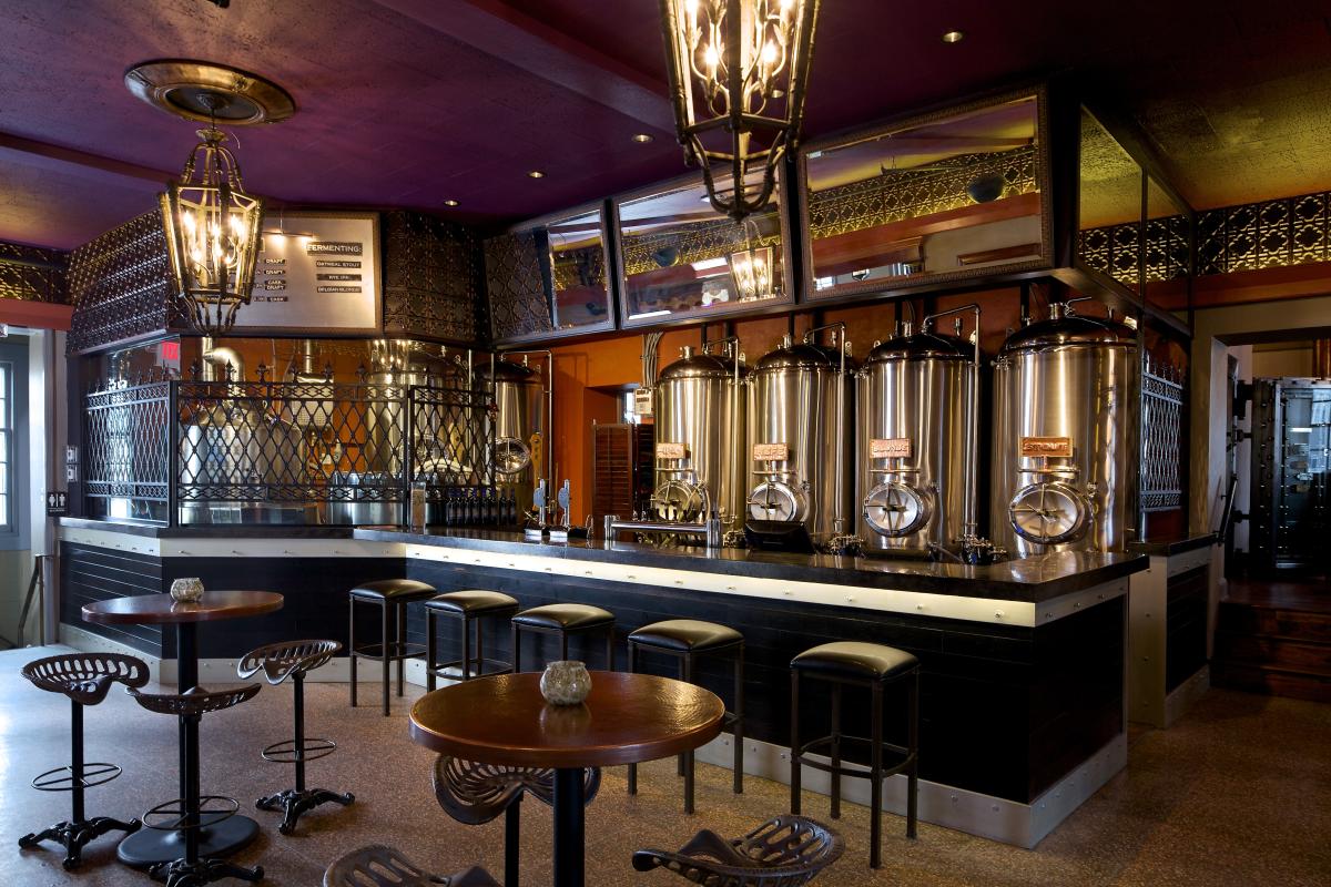 The original bank vault is now the brewing company's beer-conditioning cellar. Pair one of the speakeasy-like brewpub's five to six beers on tap each day with Pad Thai popcorn, duck and apple pizza or wood-fired s'mores.