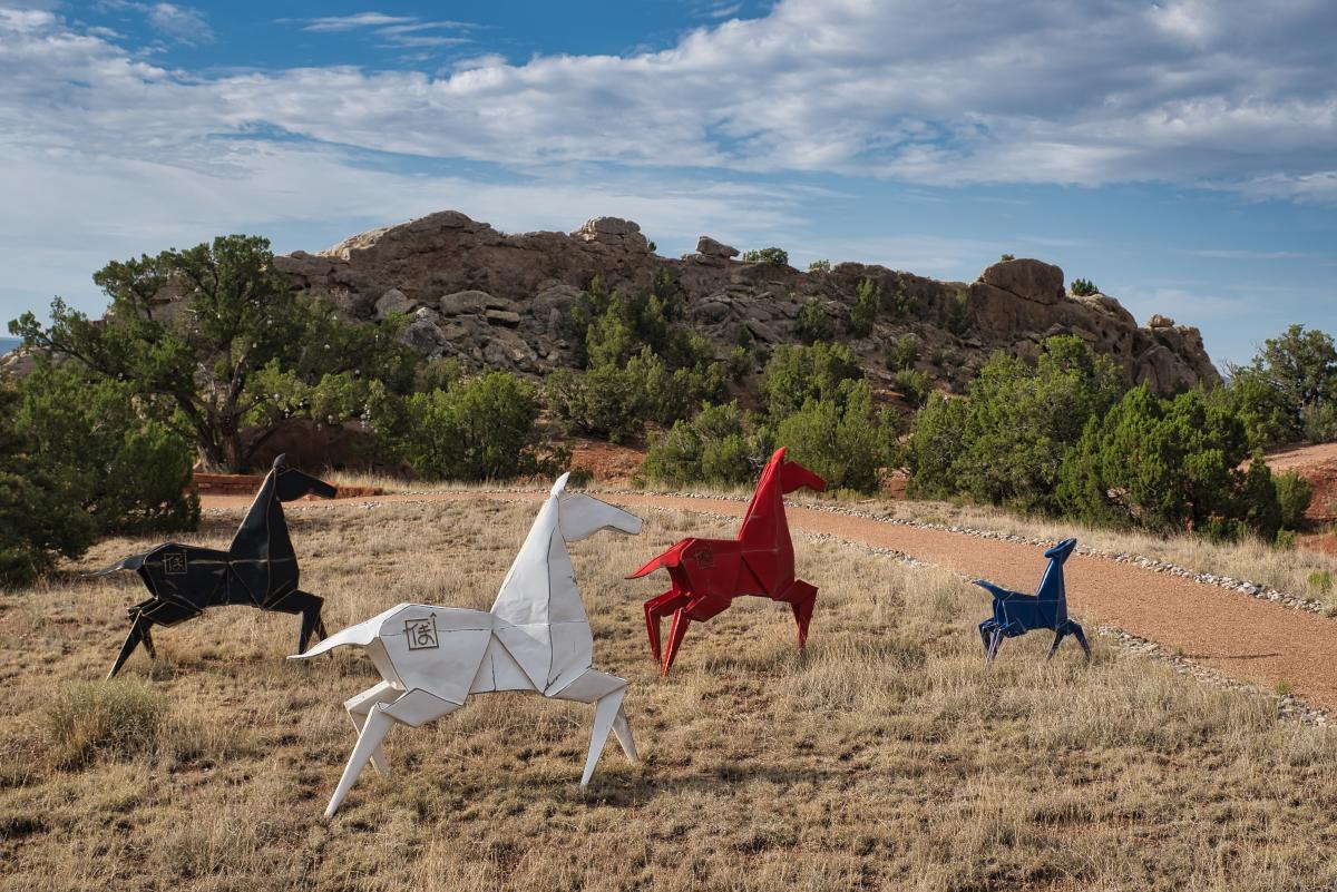 In the Folds: Ponies gallop across the sculpture garden’s yard