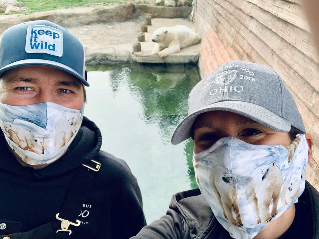 Columbus Zoo Employees posing with polar bear wearing masks