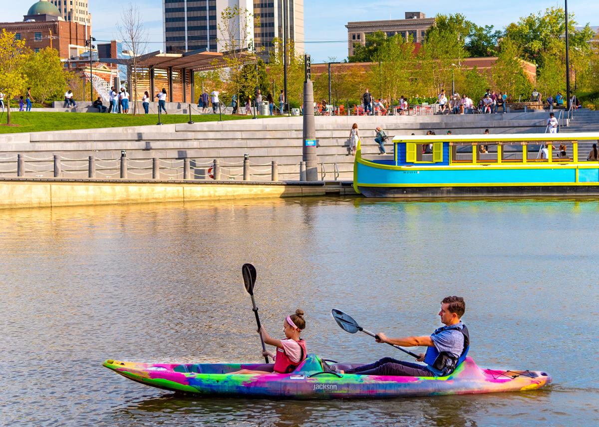 Dad and daughter kayaking on the St. Marys River at Promenade Park in Fort Wayne