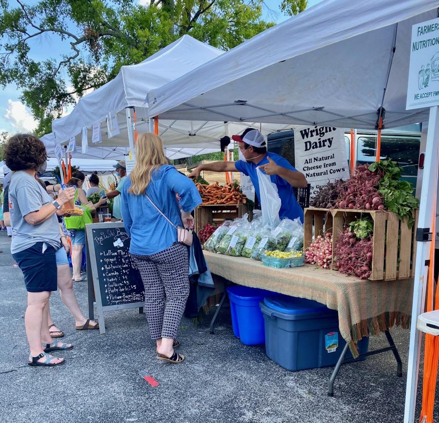 People Buying Produce At Greene Street Market