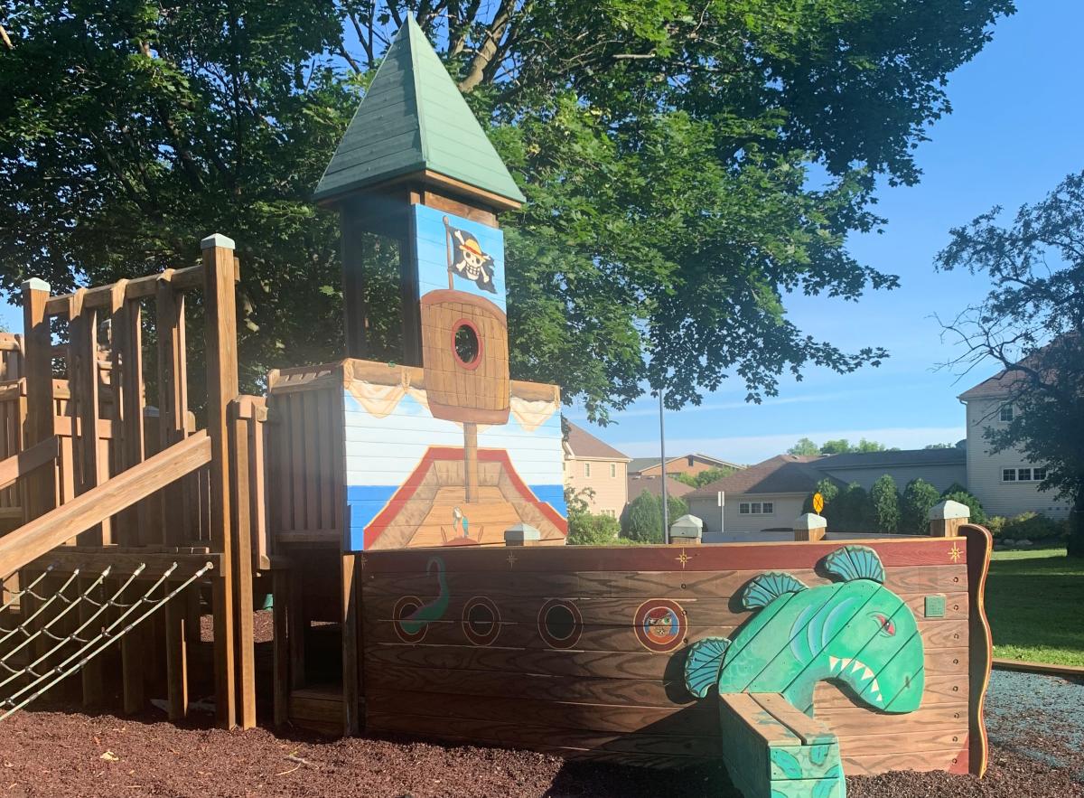 Wooden pirate ship within a playground