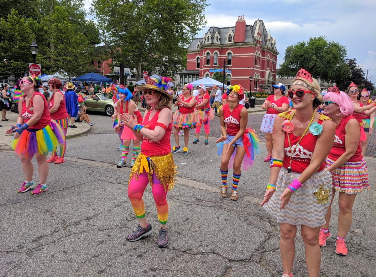 A women's dance group dressed in Pride colors at NKY Pride in Mainstrasse Village