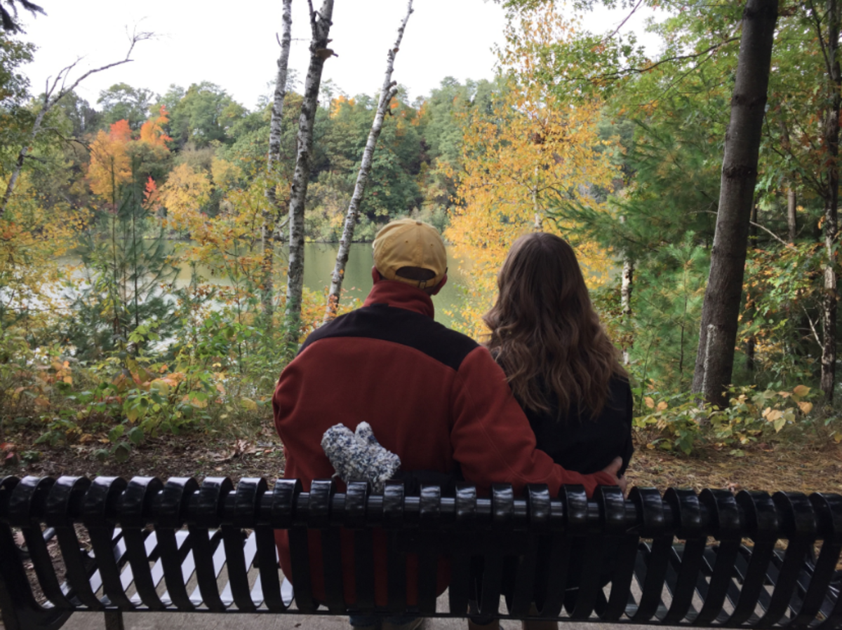 A couple on a bench overlooking the view at Carson Park