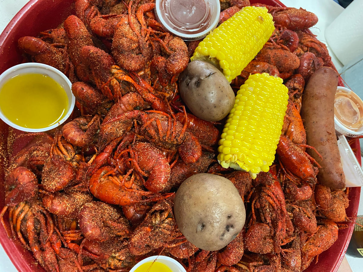 Crawfish have been seasoned and served up with corn, potatoes, and sausage.