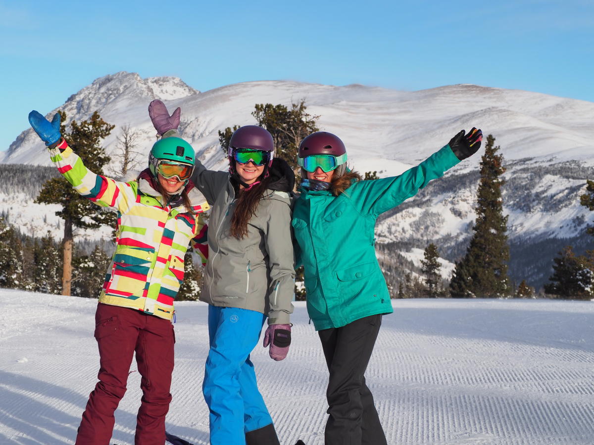 Group of women posing in ski gear at Eldora Mountain Resort