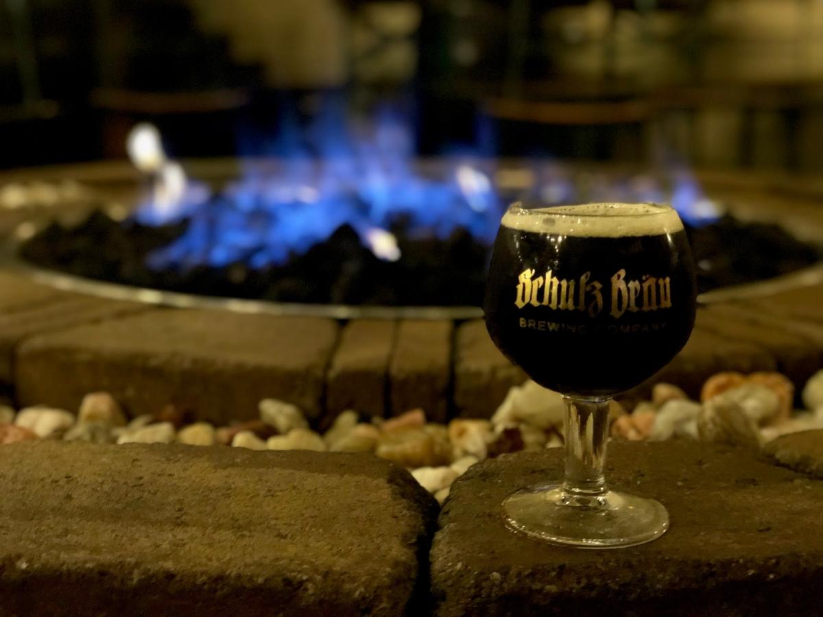 Bourbon barrel-aged Doppelbock by the fire pit at Schulz Brau