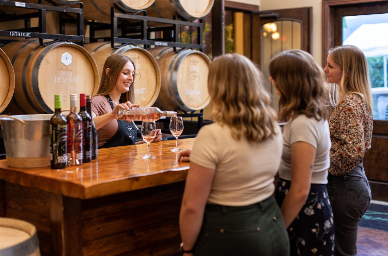 Indoor wine tasting in our barrel room at Intrigue Wines