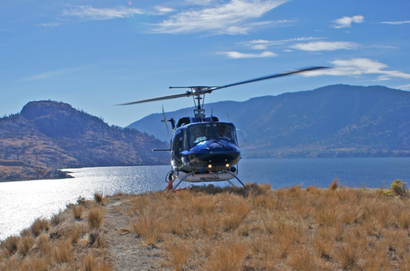 Helicopter perched on cliffs edge