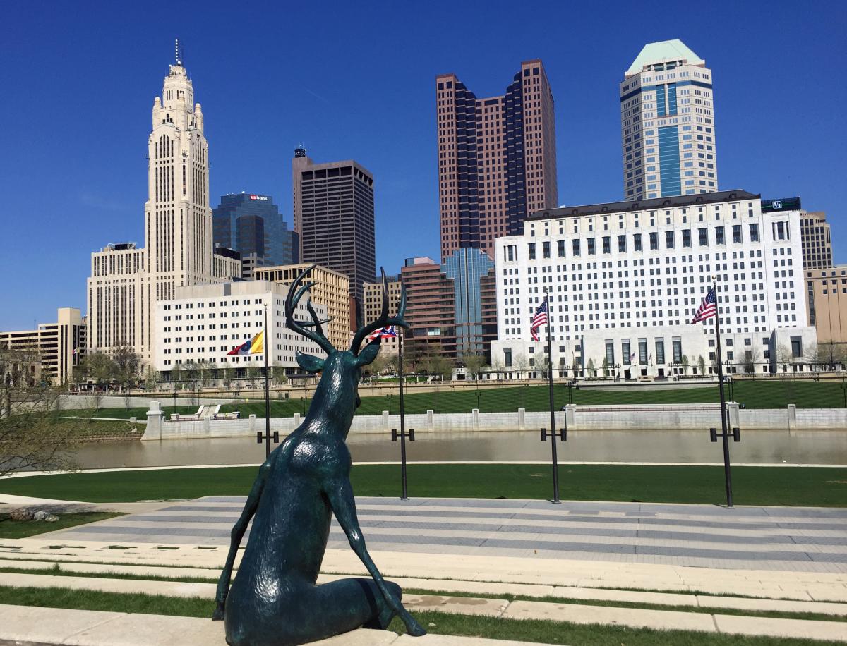 Humanized deer statue viewing the skyline from Genoa Park on the Scioto Mile