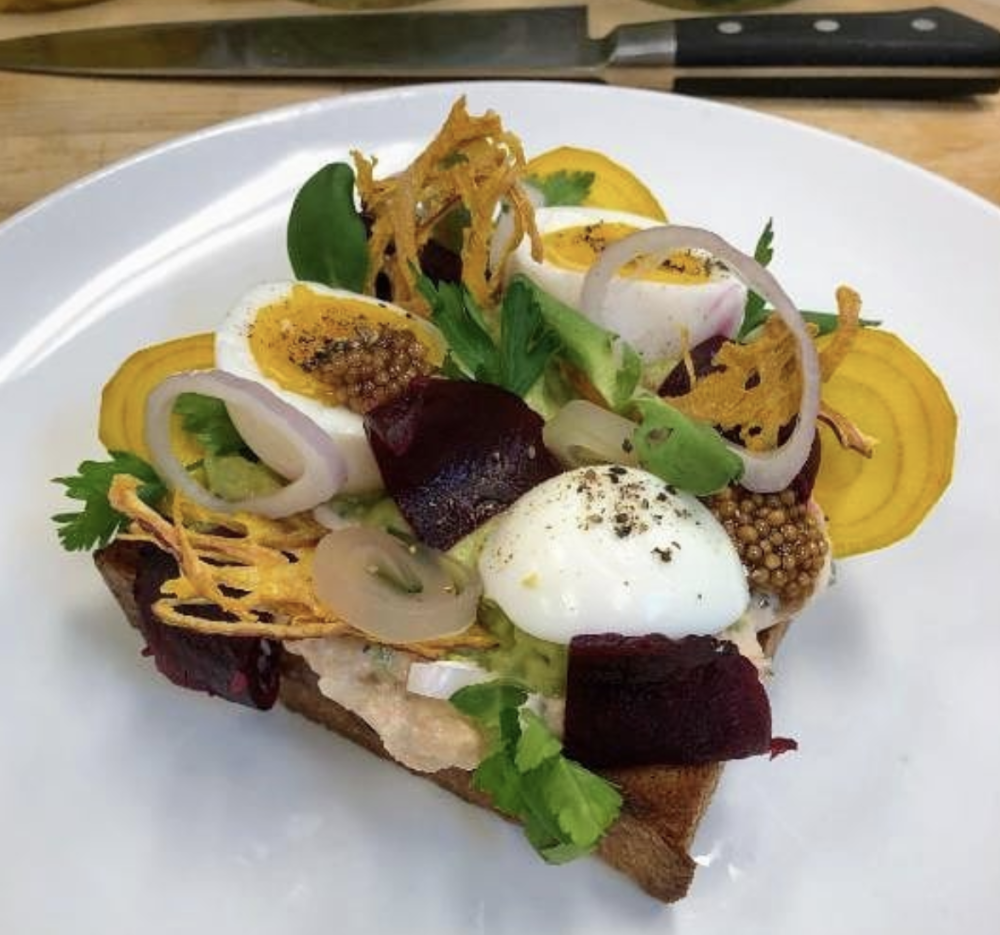 Avocado toast topped with salmon, beets, local eggs, pickled mustard seed, shallot, parsley and crispy onion is on Junk Ditch Brewing Company’s seasonal Brunch menu.