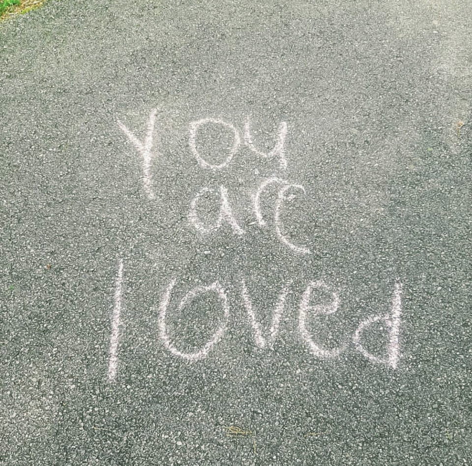 Chalk message at Wade Mountain Greenway in Huntsville