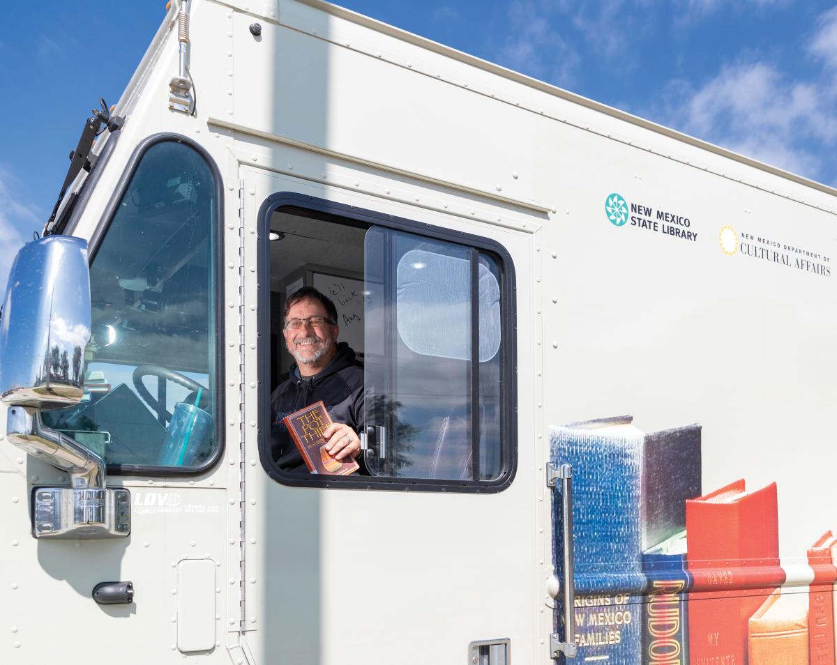 James Gallegos always takes the morning shift at the wheel of the Northeast Bookmobile.