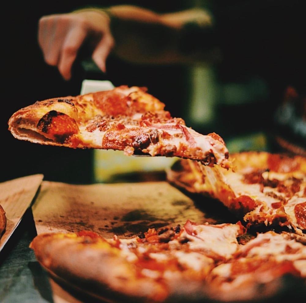 Pizza being served at Pint and Slice in Downtown Fort Wayne