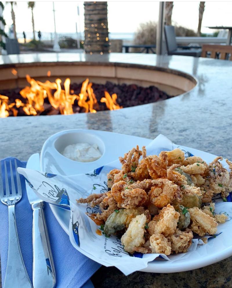 Enjoy fresh seafood and outdoor fire pits at Catch 31 in Virginia Beach.