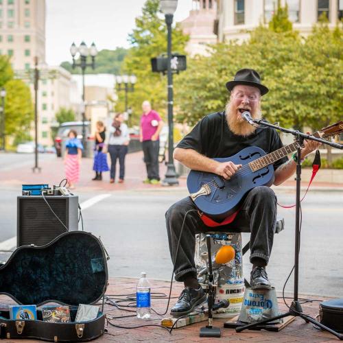 Busker in Pack Square - Square