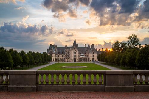 The sun sets behind the beautiful Biltmore in Asheville.
