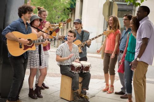 Buskers line the streets of downtown to perform for the crowd.