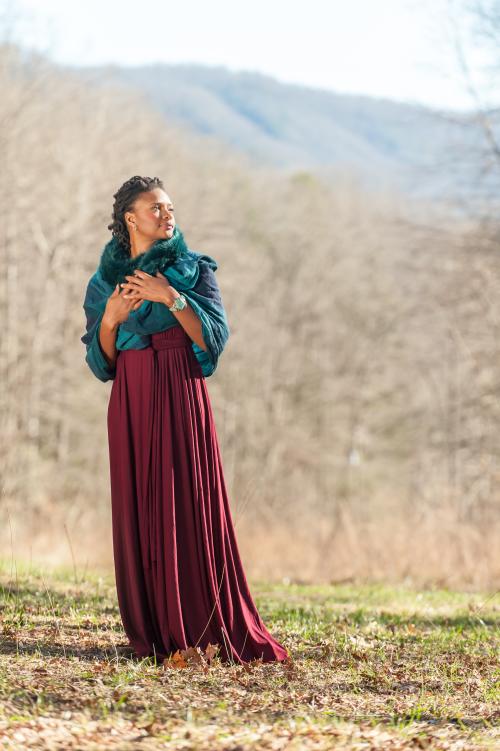 Lizz Wright stands in front of the mountains she calls home.