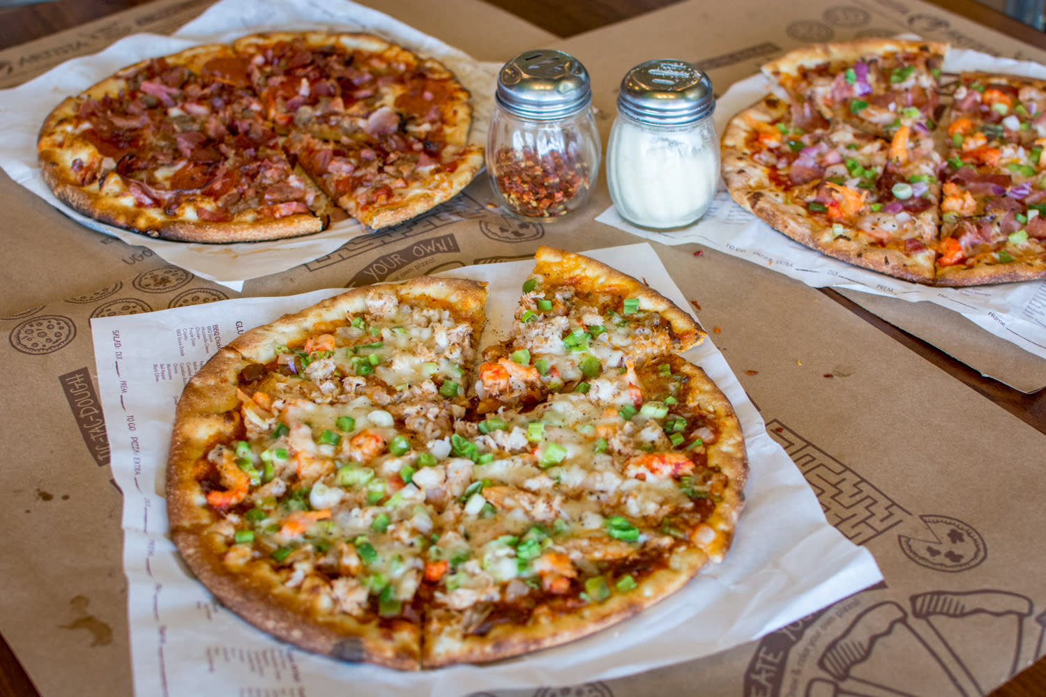 Customize Your Pies at Pizza Artista or Pick from Local Favorites