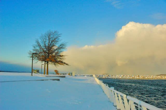 A sunlit Lake Effect storm seen from the Open Space on West Bay