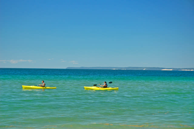 Paddling on Lake Michigan (That's South Manitou Island in the background.)