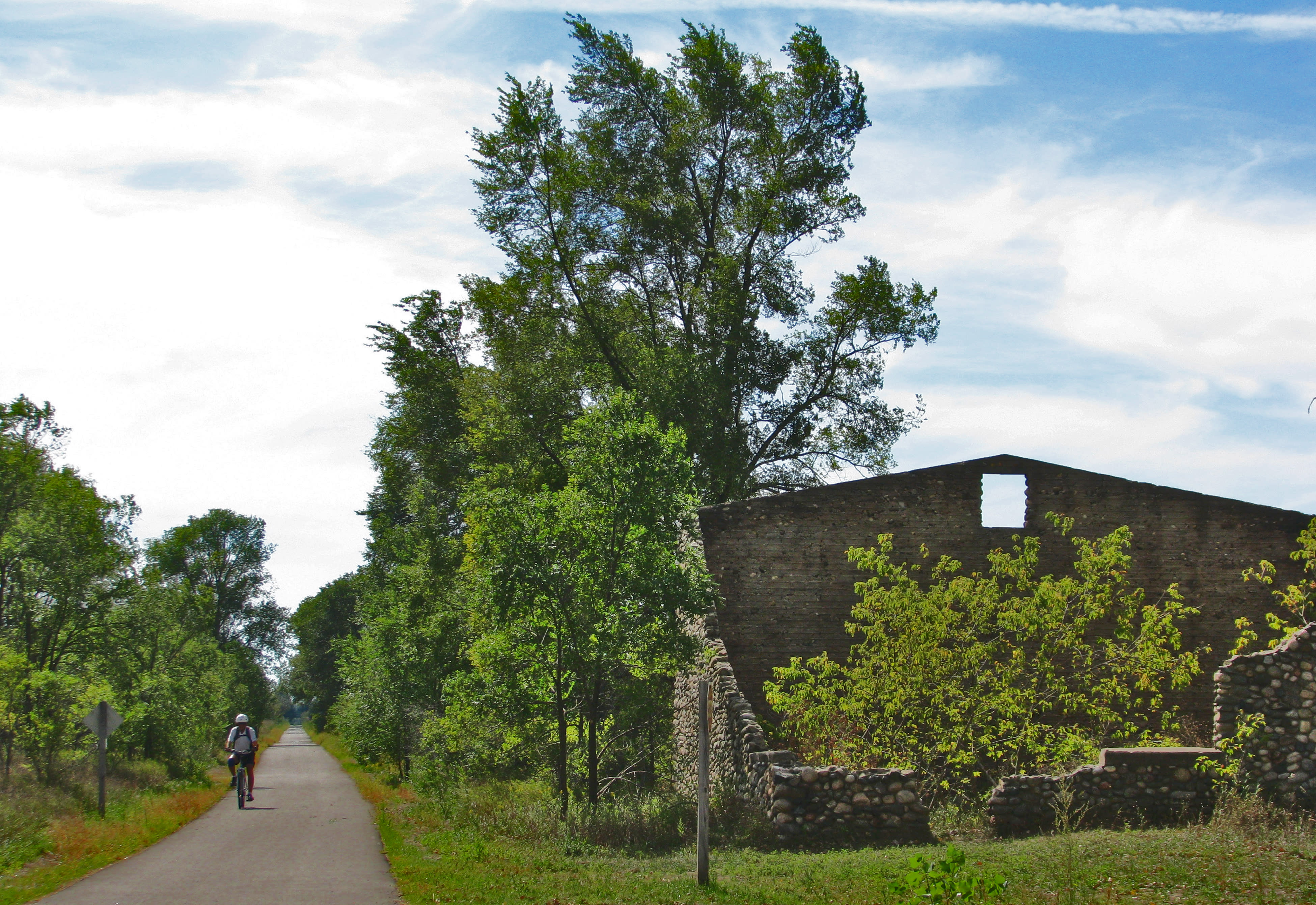 Passing a ruined stone barn on the Leelanau Trail.