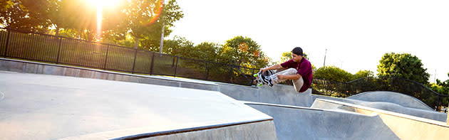 A man skateboarding at the Mat Hoffman Action Sports Park in OKC