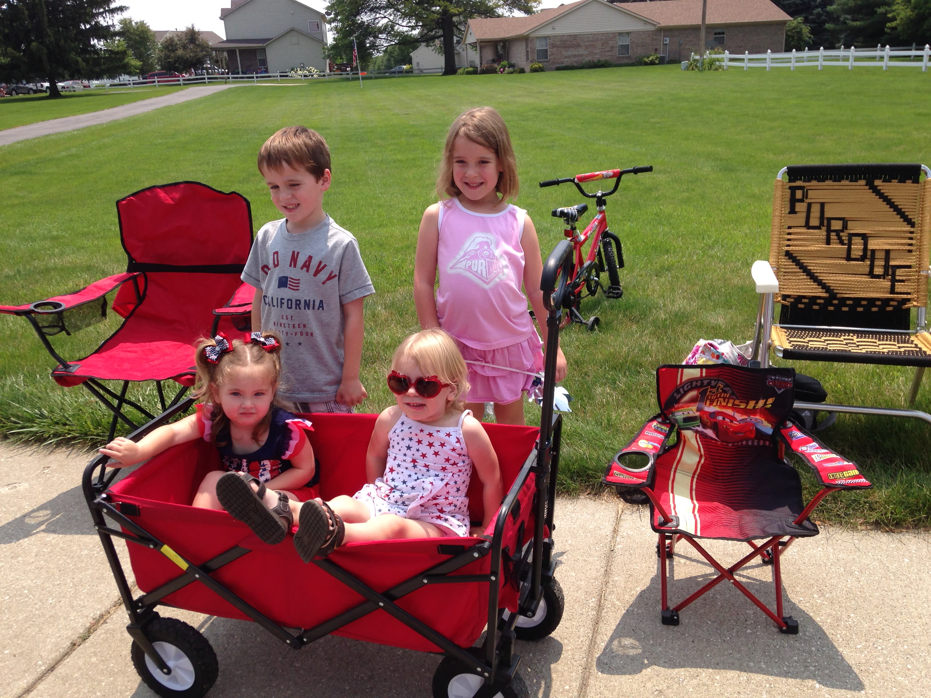 The kiddos anxiously awaiting the Pittsboro Fourth of July parade. pittsboro, IN, independence parade