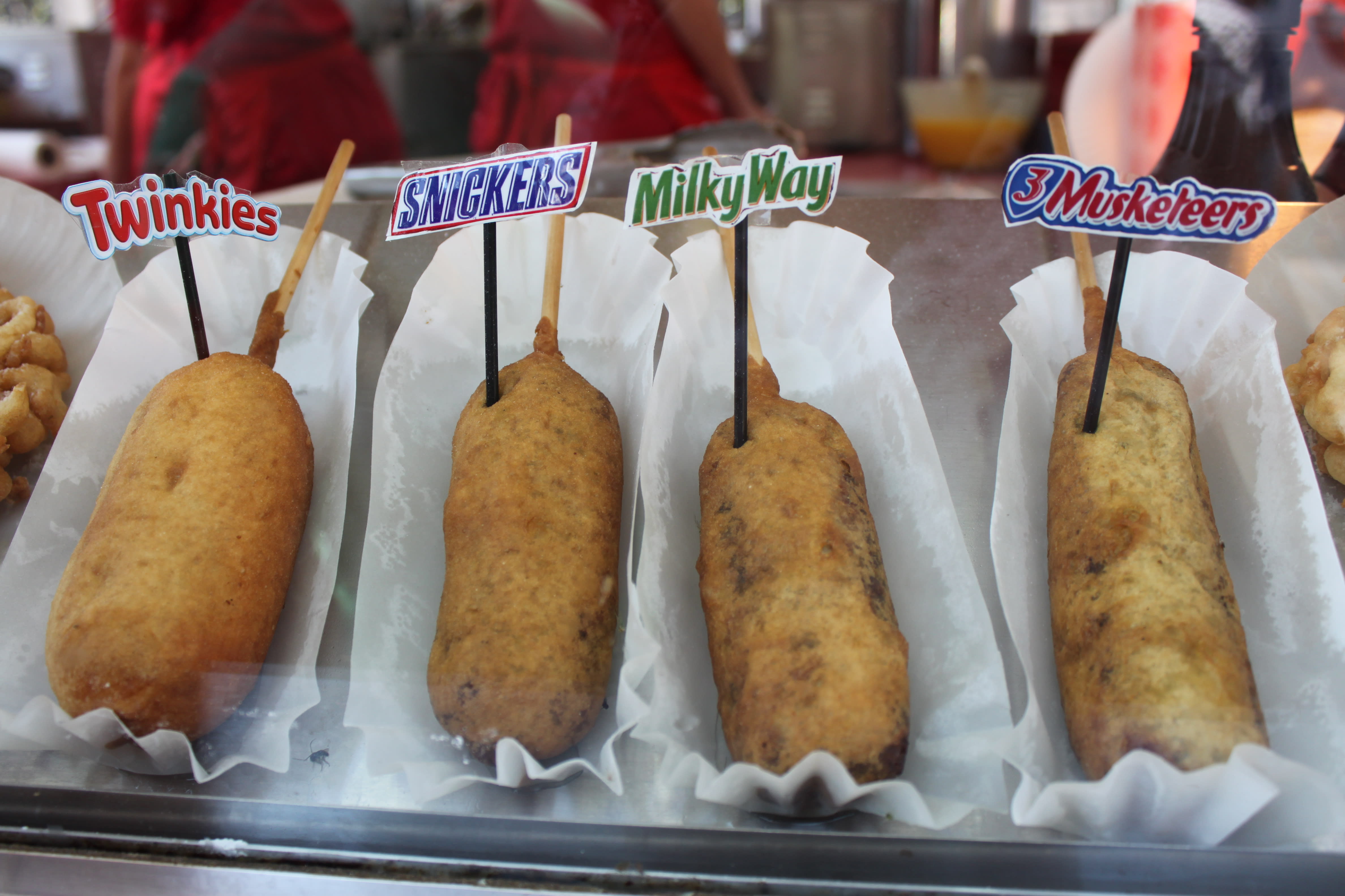 Deep fried candy bars are just some of the sinful street food you'll find in Junk Food Alley!