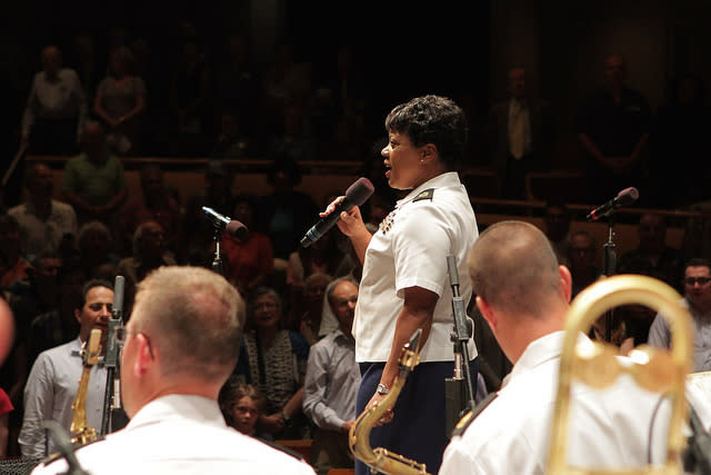 Foellinger Theater during a performance of the U. S. Army Band and Chorus A member of the US Army Chorus sings at Foellinger Theater